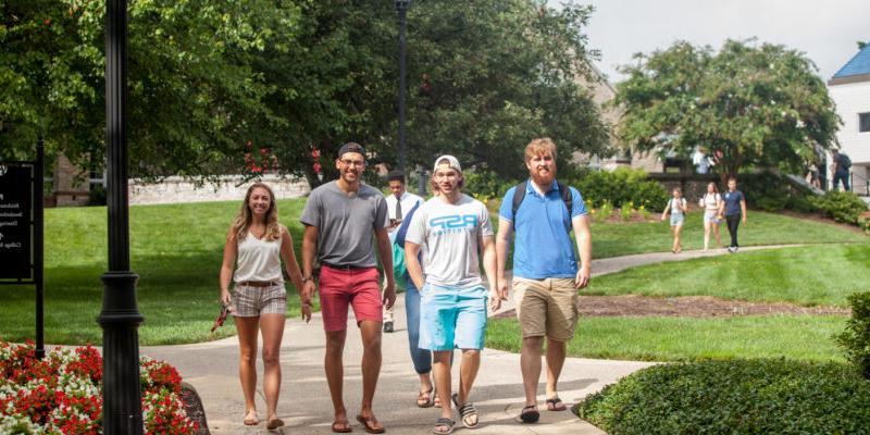 Bryn Athyn College students walking to class on a warm sunny day